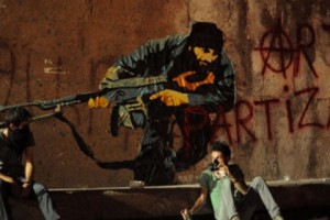 Street Art Group Adorns Yerevan Metro Wall with Armed Partisan